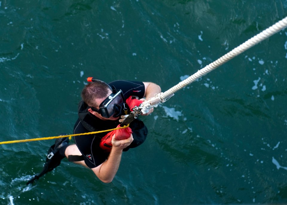 US Navy 111030-N-FI736-086 Seaman Jeremiah Pherigo, a search and rescue swimmer aboard the guided-missile destroyer USS Arleigh Burke (DDG 51), is