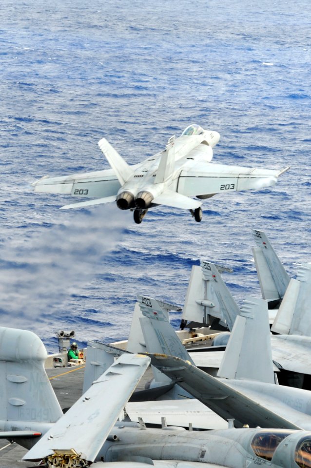 US Navy 111029-N-JO245-033 An F-A-18E Super Hornet from the Royal Maces of Strike Fighter Squadron (VFA) 27 launches from the aircraft carrier USS