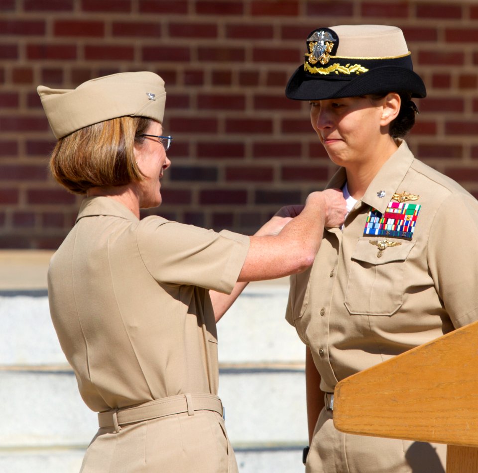 US Navy 111104-N-XX082-852 Center for Information Dominance Commanding Officer Capt. Susan K. Cerovsky pins Cmdr. Luciana Sung as the first command