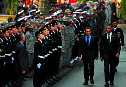 US Navy 111104-N-NW827-072 President Barack Obama and French President Nicolas Sarkozy review French and U.S. service members