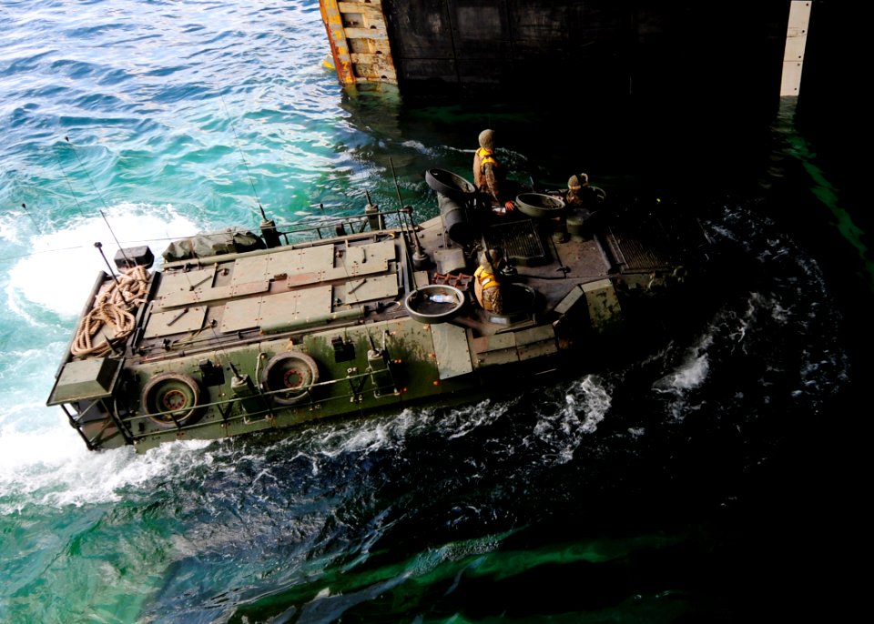 US Navy 111101-N-WJ771-141 An amphibious assault vehicle assigned to the 31st Marine Expeditionary Unit enters the well deck of the forward-deploye