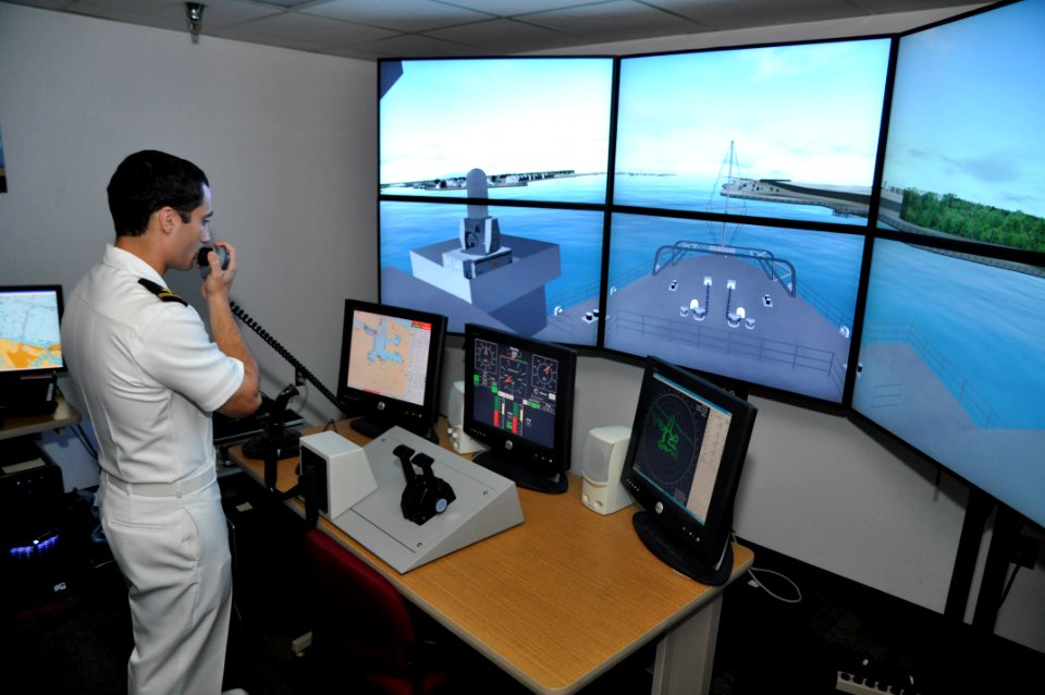 US Navy 111103-N-YX169-043 Ensign Jared Hickey, assigned to the amphibious transport dock ship USS Ponce (LPD 15), uses a voice-recognition system