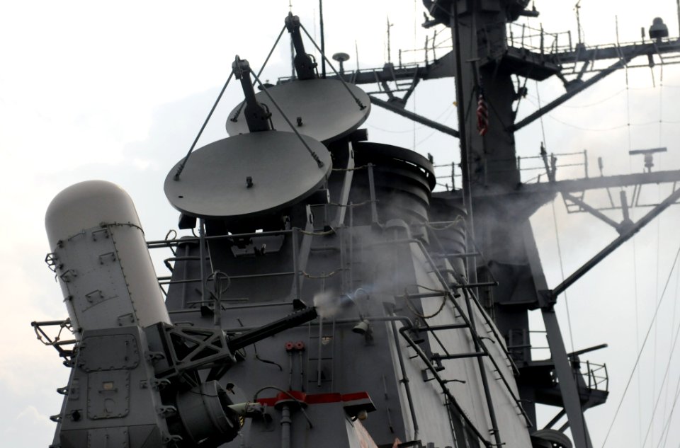 US Navy 111101-N-XQ375-071 A Mk-15 Phalanx Close-In Weapons System fires during a weapons exercise aboard the guided-missile destroyer USS Mitscher