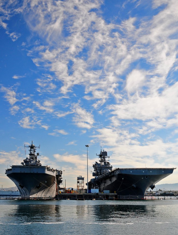 US Navy 111108-N-ZS026-009 The amphibious assault ships USS Peleliu (LHA 5), left, and USS Makin Island (LHD 8) are moored pierside at Naval Base S