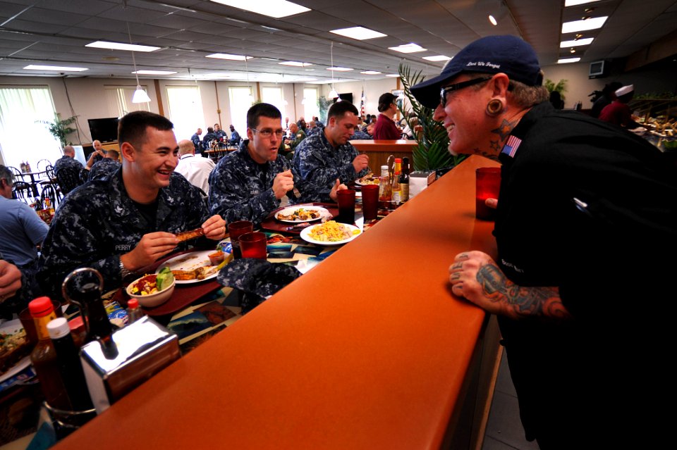 US Navy 111102-N-YR391-064 Celebrity chef Mike Hardin talks with Sailors