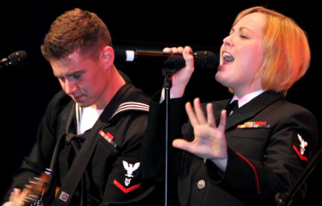 US Navy 111106-N-IK959-297 Musician 3rd Class Steve Lamonica and Musician 3rd Class Michelle Werner perform Journey's