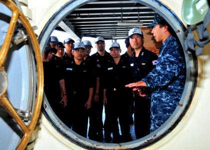 US Navy 111107-N-BK435-012 Navy Diver 2nd Class John Miranda, assigned to the submarine tender USS Frank Cable (AS 40), shows the ship's recompress