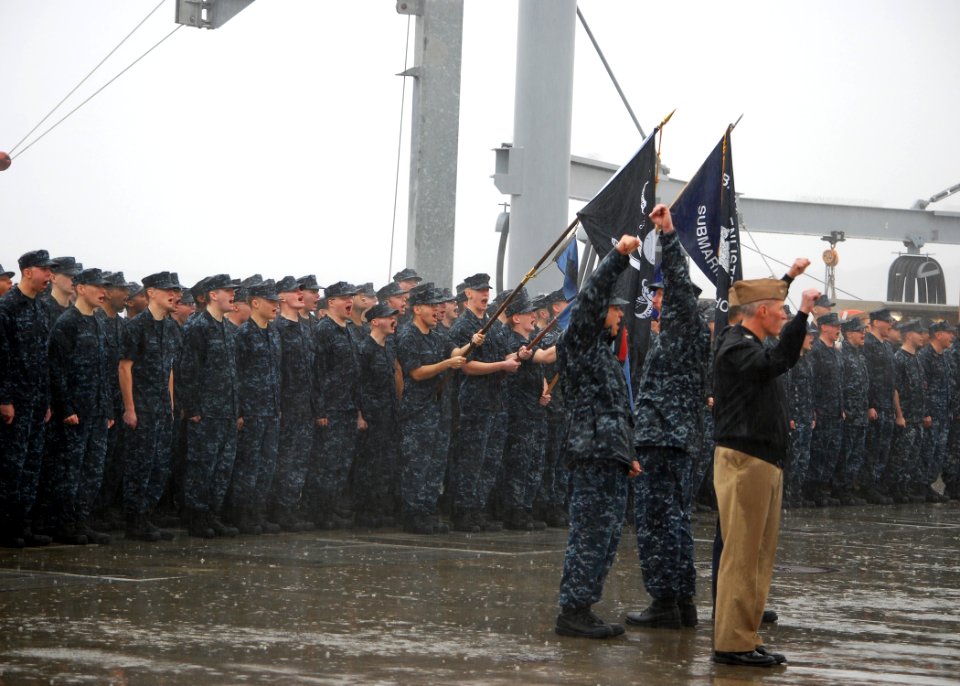 US Navy 111110-N-AW342-042 Sailors attending Basic Enlisted Submarine School in Groton Conn. cheer the as the Los Angeles-class attack submarine US