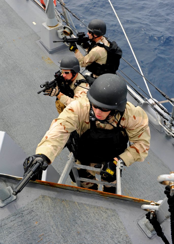 US Navy 111108-N-VH839-024 Sailors conduct a visit, board, search, and seizure training exercise aboard the Arleigh Burke-class guided-missile dest