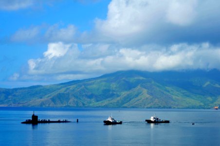 US Navy 111110-N-JH293-019 The Virginia-class fast attack submarine USS Texas (SSN 775), accompanied by two tug boats, transits into Subic Bay to c