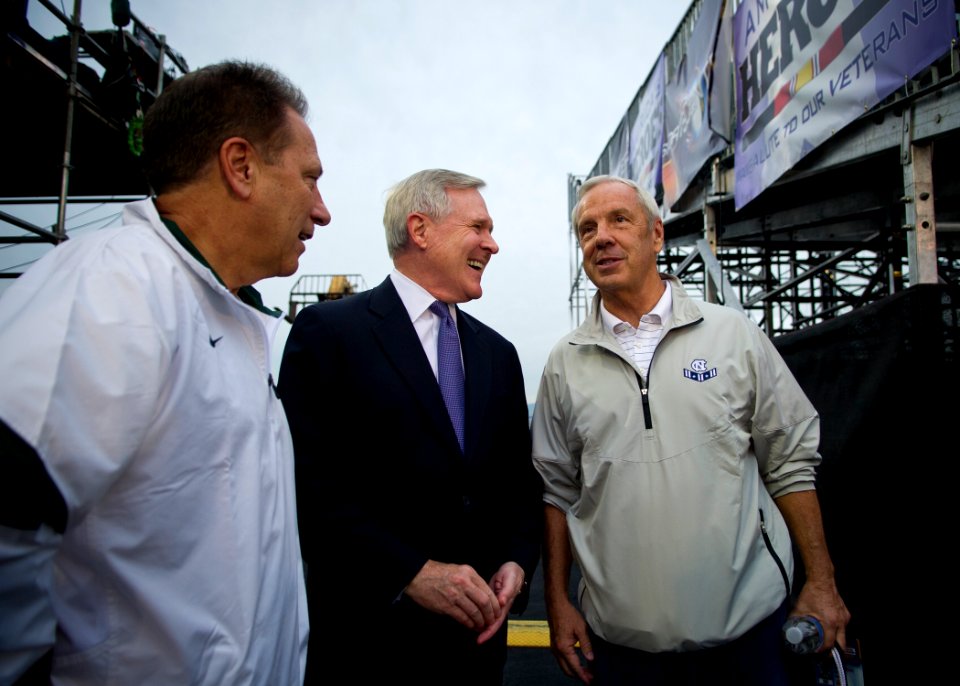 US Navy 111110-N-AC887-002 Secretary of the Navy (SECNAV) the Honorable Ray Mabus shares a laugh with Tom Izzo, head basketball coach for Michigan