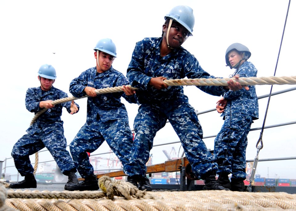 US Navy 111105-N-WJ771-007 Sailors heave around a mooring line on the forecastle of USS Germantown