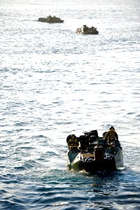 US Navy 111108-N-ZC343-360 Marines practice maneuvering amphibious assault vehicles into the well deck of the amphibious assault ship USS Bonhomme