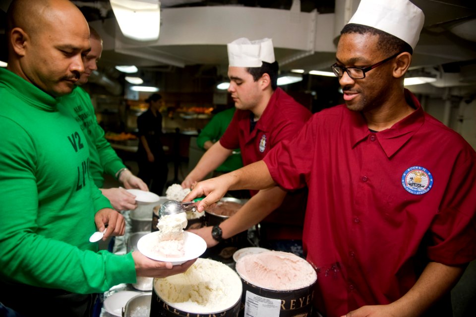 US Navy 111109-N-RJ456-043 Sailors participate in an ice cream day aboard USS John C. Stennis