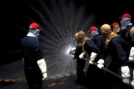 US Navy 111107-N-SF704-139 Sailors aboard the aircraft carrier USS George Washington (CVN 73) practice fire hose handling techniques during a gener
