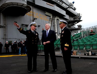 US Navy 111110-N-DR144-205 Commanding Officer Capt. Bruce H. Lindsey, left, and Commander, Carrier Strike Group 1 Rear Adm. Samuel Perez, right, sp