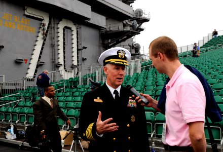 US Navy 111110-N-GZ277-308 Capt. Bruce H. Lindsey, left, commanding officer of the aircraft carrier USS Carl Vinson (CVN 70), speaks with media on