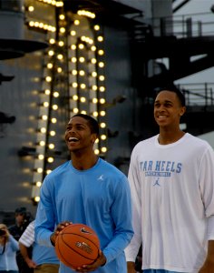 US Navy 111110-N-JN664-297 University of North Carolina basketball players Dexter Strickland, left, and John Henson, right, practice aboard the Nim