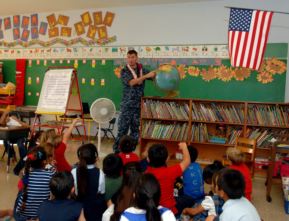 US Navy 111110-N-YU572-111 Naval Air Crewman 1st Class Scott Barrow speaks to students at St. Theresa Catholic School about his naval career
