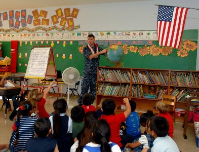 US Navy 111110-N-YU572-111 Naval Air Crewman 1st Class Scott Barrow speaks to students at St. Theresa Catholic School about his naval career