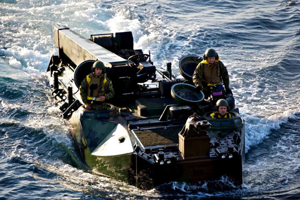 US Navy 111108-N-ZC343-365 Marines practice maneuvering amphibious assault vehicles into the well deck of the amphibious assault ship USS Bonhomme