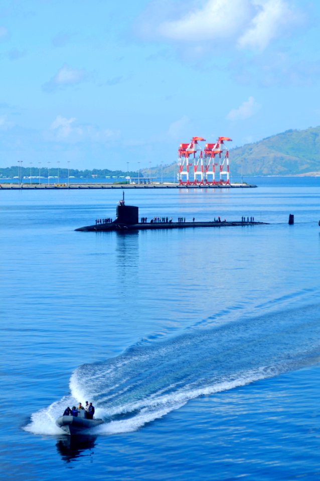 US Navy 111110-N-JH293-024 The Virginia-class fast attack submarine USS Texas (SSN 775) passes the Port of Subic Bay as a rigid-hull inflatable boa