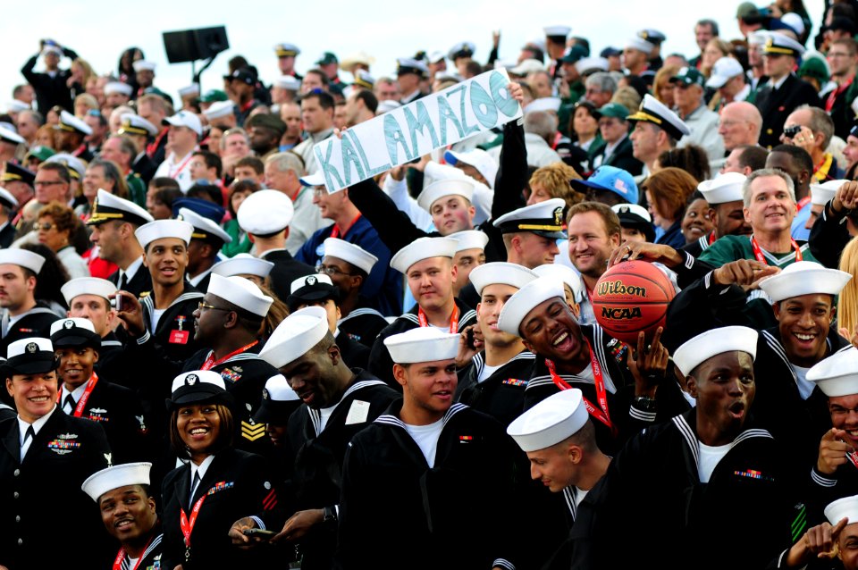 US Navy 111111-N-SB672-327 Sailors assigned to the Nimitz-class aircraft carrier USS Carl Vinson (CVN 70) watch the Quicken Loans Carrier Classic