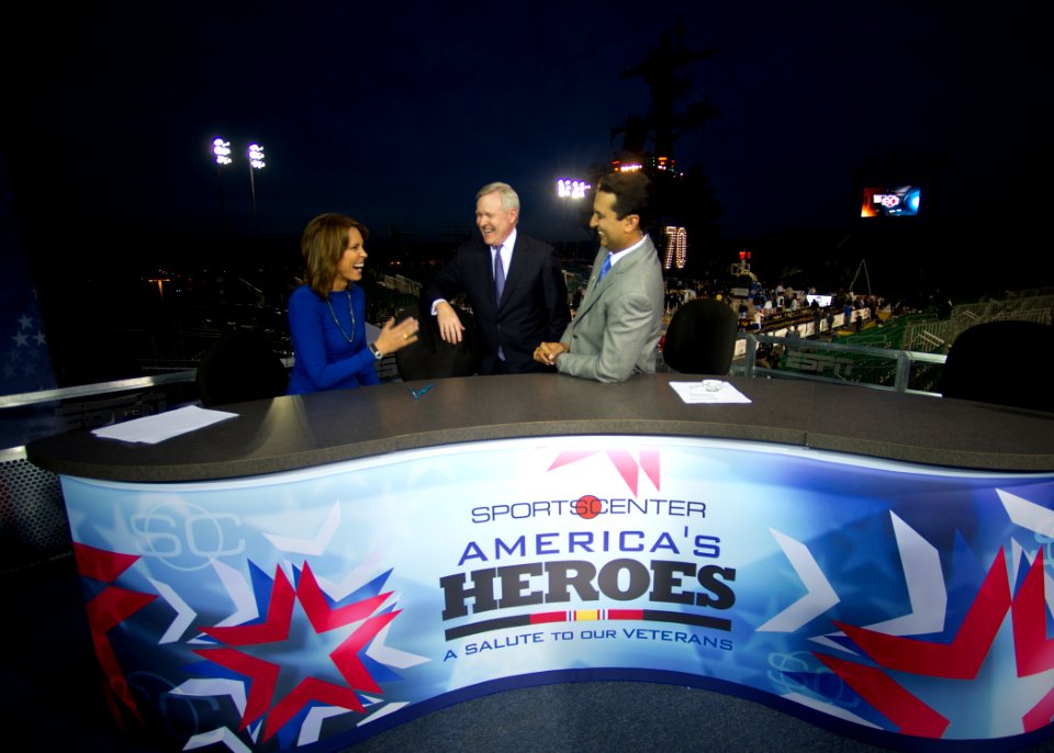 US Navy 111110-N-AC887-003 Secretary of the Navy (SECNAV) the Honorable Ray Mabus shares a laugh with ESPN SportsCenter anchors Hannah Storm and Ke