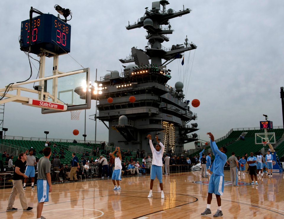 US Navy 111110-N-DR144-327 The University of North Carolina basketball team practices in the basketball arena on the flight deck aboard the Nimitz