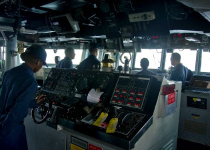 US Navy 111112-N-RI884-010 Members of the bridge watch team aboard the guided-missile destroyer USS O'Kane (DDG 77) conduct training as part of the