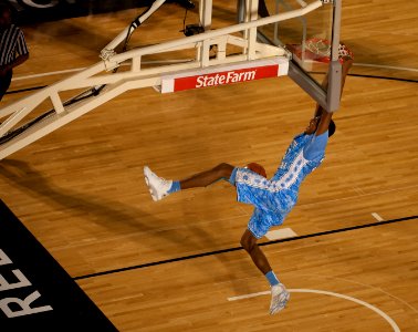 US Navy 111111-N-DR144-188 The University of North Carolina's John Henson scores during the Quicken Loans Carrier Classic aboard the Nimitz-class a