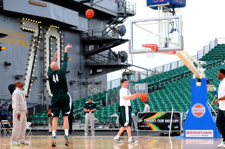 US Navy 111111-N-SB672-035 Michigan State University basketball players practice on the flight deck of the Nimitz-class aircraft carrier USS Carl V