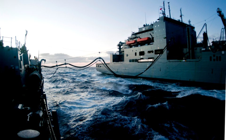 US Navy 111112-N-WX059-340 Sailors from the guided-missile destroyer USS Chafee (DDG-90) partake in an under way replenishment with the USNS Washin