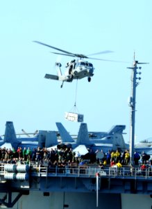 US Navy 111112-N-QL471-332 An MH-60S Sea Hawk conducts a vertical replenishment