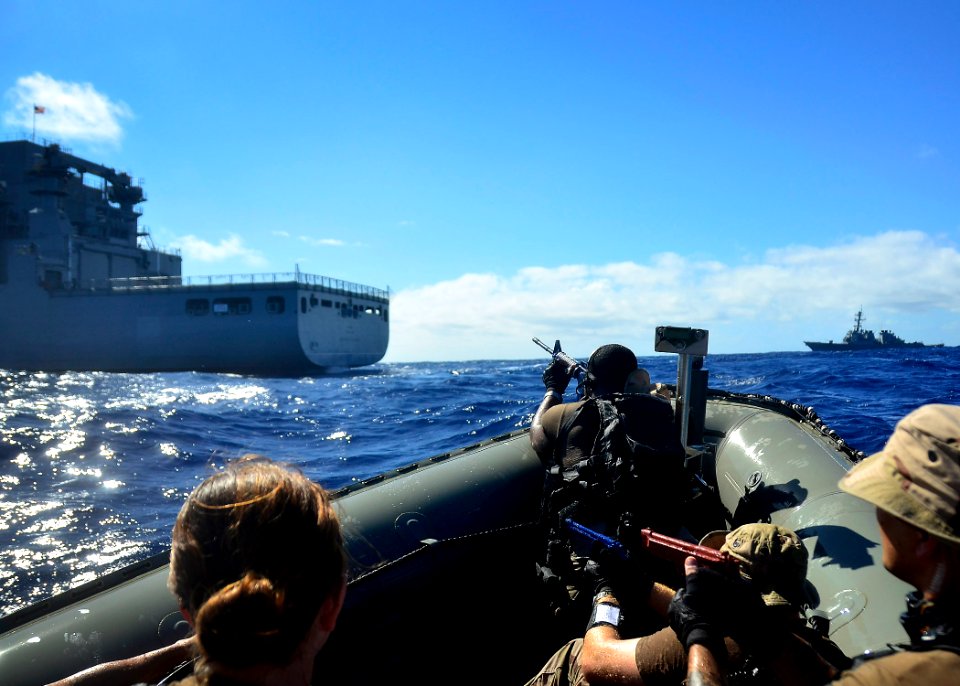 US Navy 111112-N-RI884-439 Members of a visit, board, search and seizure team from the guided-missile destroyer USS O'Kane (DDG 77) prepare to boar
