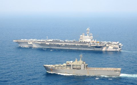 US Navy 111115-N-TU894-077 The aircraft carrier USS George H.W. Bush (CVN 77) is underway with the Singapor Navy tank landing ship RSS Endeavour (2