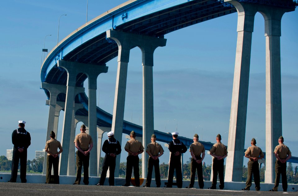 US Navy 111114-N-PB383-347 Sailors and Marines aboard the amphibious transport dock ship USS New Orleans (LPD 18) man the rails as the ship transit