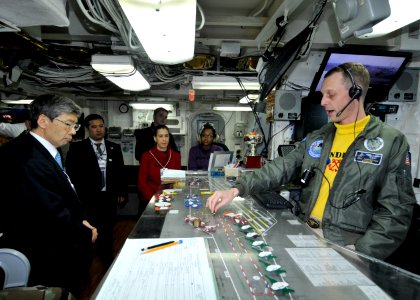 US Navy 111118-N-JO245-013 A Sailor gives a flight deck operations briefing to members of the Japan Ministry of Defense