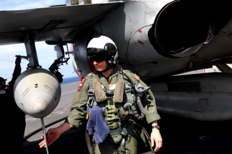 US Navy 111115-N-WW409-100 Rear Adm. J.R. Haley conducts preflight checks on an EA-6B Prowler aboard the Nimitz-class aircraft carrier USS George W