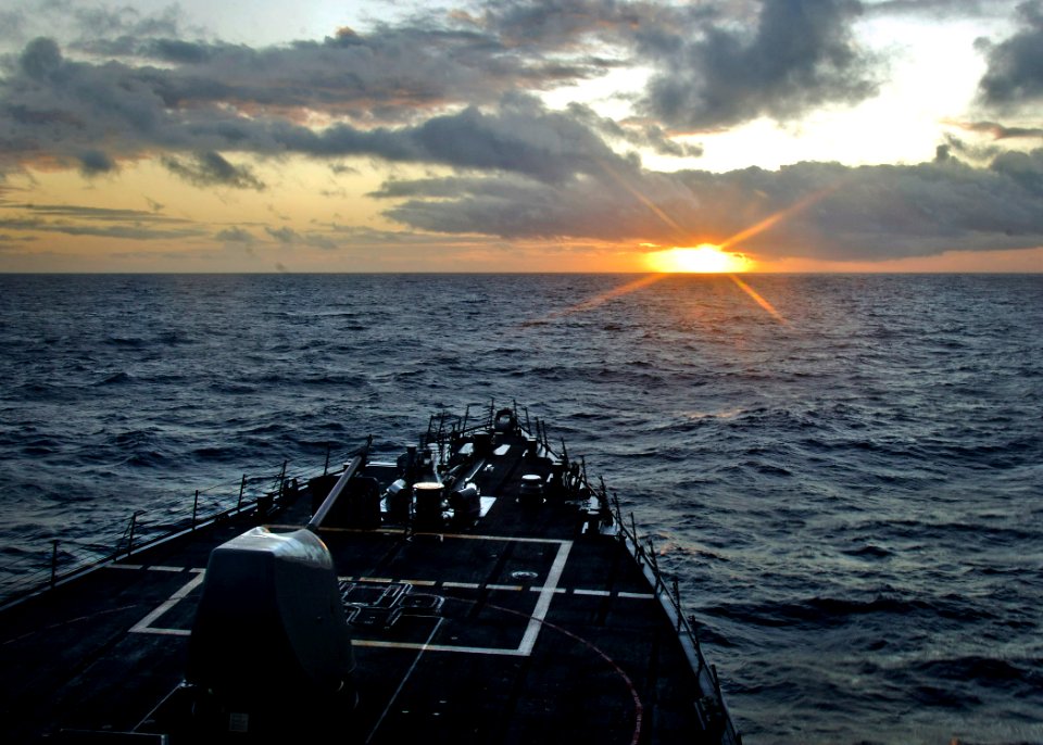 US Navy 111111-N-RI884-016 The guided-missile destroyer USS O'Kane (DDG 77) performs maneuvers during sunrise as part of the integrated maritime ex