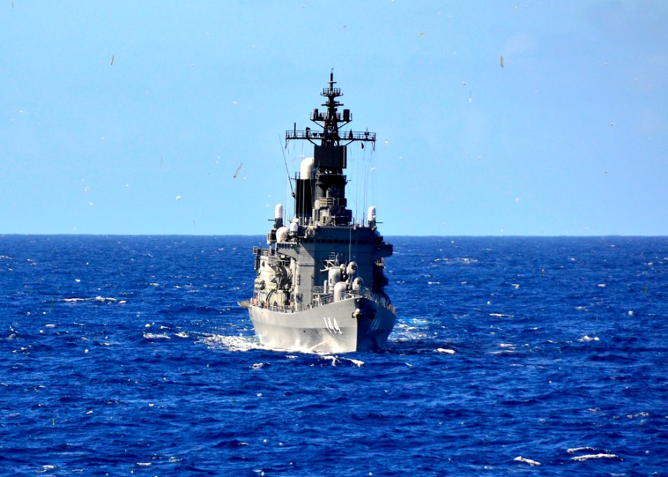 US Navy 111112-N-RI884-021 The Japan Maritime Self-Defense Force helicopter destroyer JS Kurama (DDH 144) test fires chafe as part of the integrate