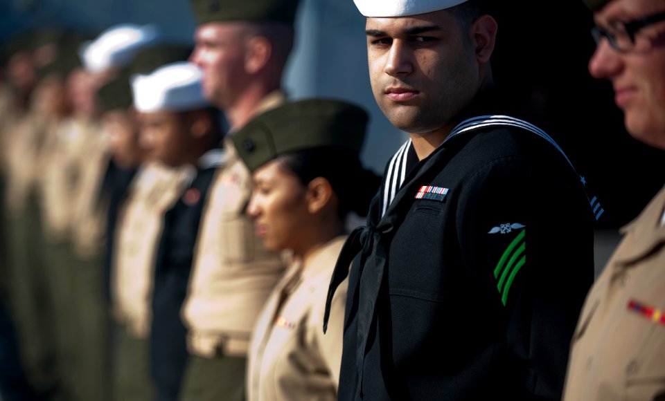 US Navy 111114-N-PB383-269 Sailors and Marines aboard the amphibious transport dock ship USS New Orleans (LPD 18) man the rails as the ship departs