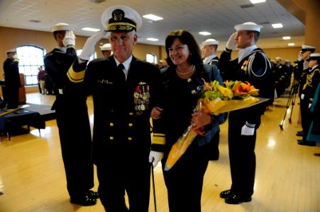 US Navy 111117-N-PO203-394 Rear Adm. Nevin Carr and his wife, Ann Cary, pass through ceremonial sideboys after a change of command ceremony and ret photo