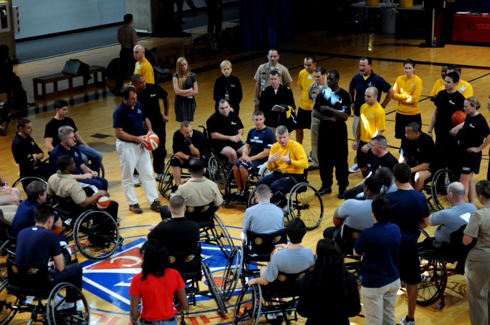 US Navy 111118-N-AD372-022 Master Chief Petty Officer of the Navy (MCPON) Rick D. West motivates players before the Navy Safe Harbor Wheel Chair Ex
