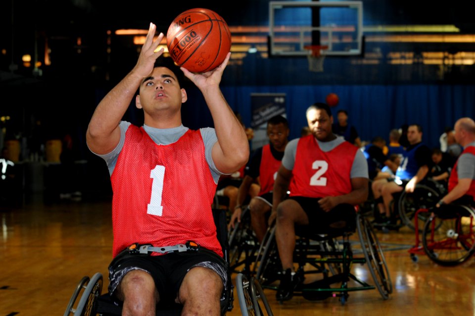 US Navy 111118-N-PM781-004 Lance Cpl. John Stearns warms up before a wounded warrior wheelchair basketball exhibition at the Pentagon