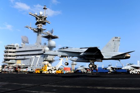 US Navy 111117-N-XE109-461 An F-A-18C Hornet lands on the flight deck