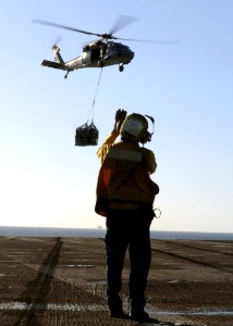 US Navy 111118-N-YC505-277 Sailor works on the deck of the aircraft carrier USS George H.W. Bush (CVN 77)