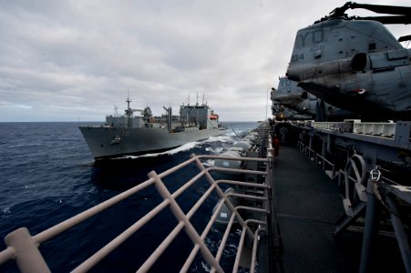 US Navy 111116-N-DX615-017 The Military Sealift Command dry cargo and ammunition ship USNS Charles Drew (T-AKE 10) operates alongside the amphibiou