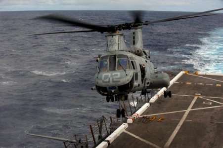 US Navy 111116-N-PB383-097 A CH-46E Sea Knight helicopter lands aboard the amphibious transport dock ship USS New Orleans (LPD 18) during flight qu