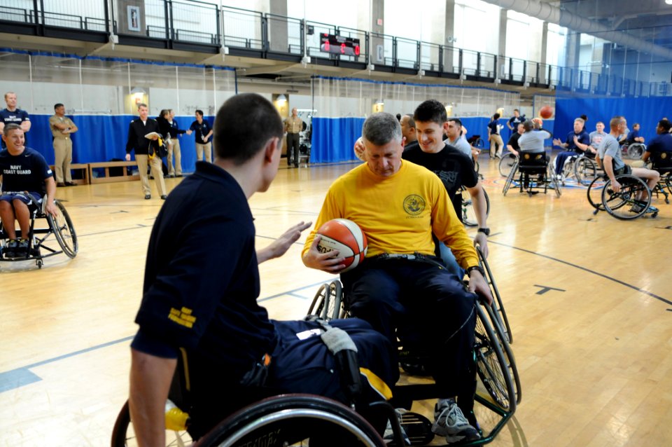 US Navy 111118-N-AD372-016 Master Chief Petty Officer of the Navy (MCPON) Rick D. West received a quick tutorial before the Navy Safe Harbor Wheel